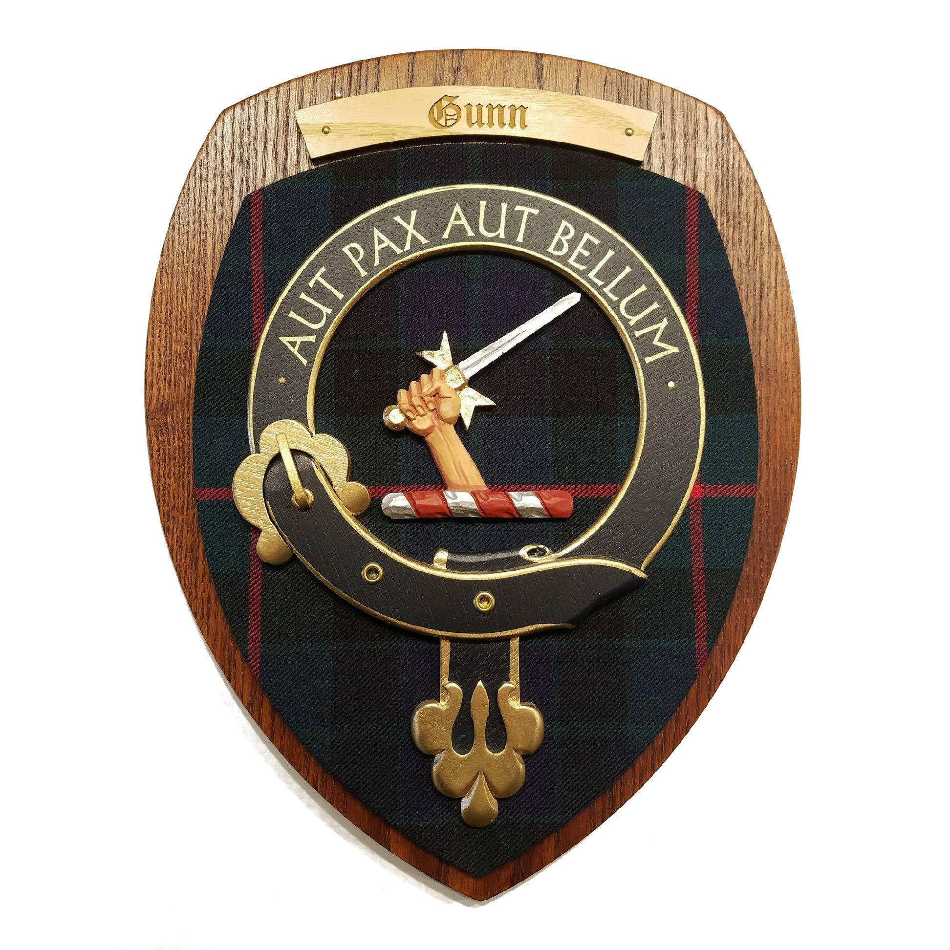 wooden wall plaque with Gunn family crest & tartan