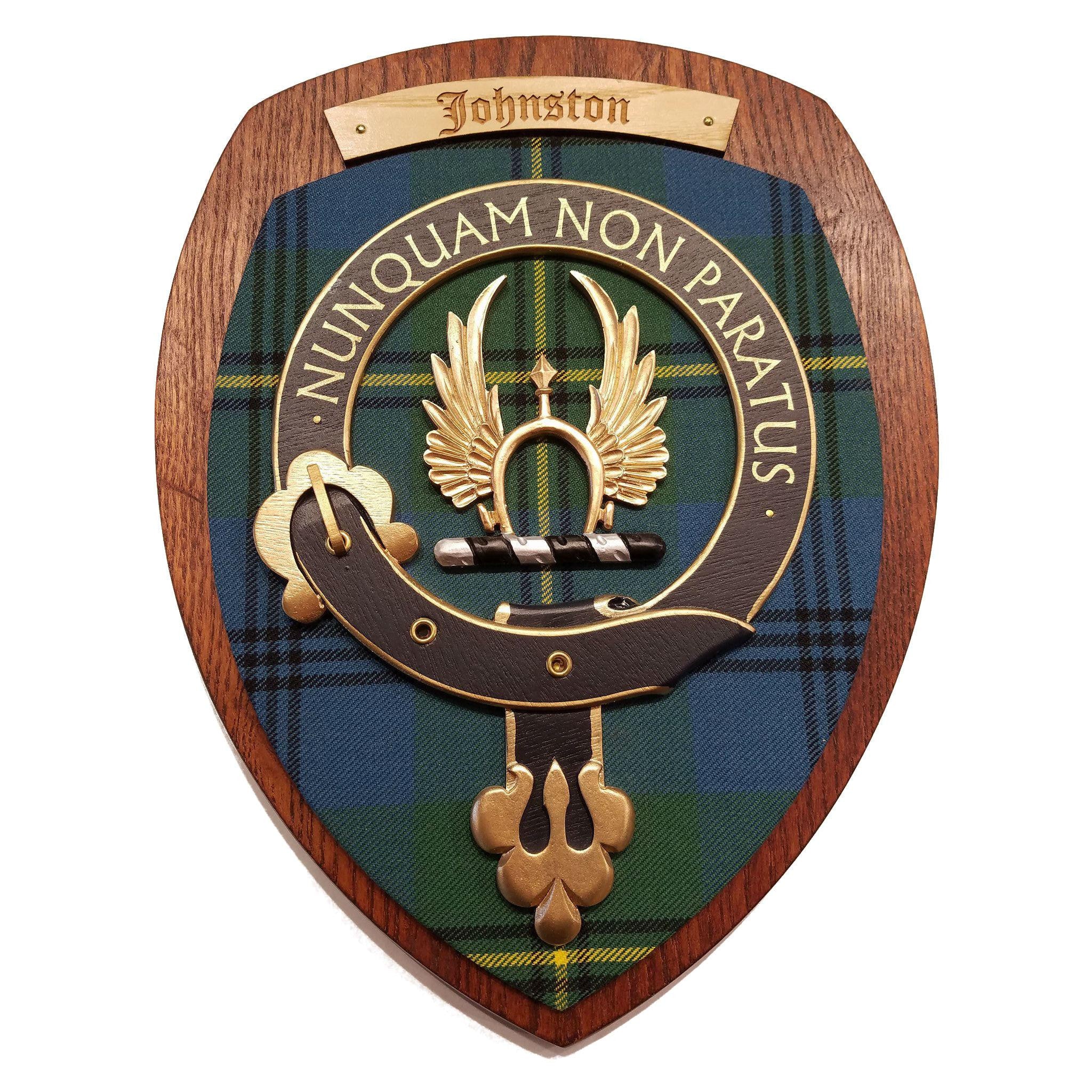 wooden wall plaque with Johnston family crest & tartan